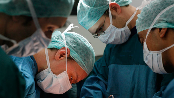 Doctors at work during a womb transplant in Sweden