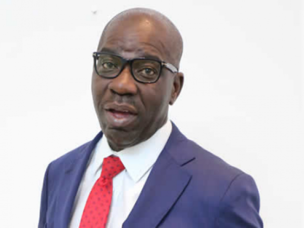 Godwin Obaseki suited